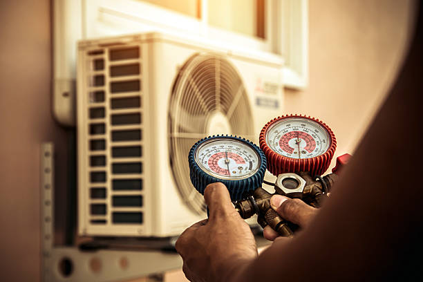 Professional Heat Pump Repair technician working in Dayton, OH